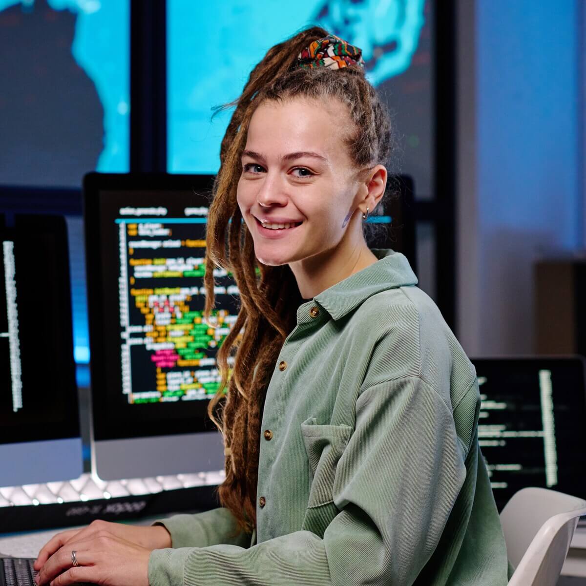 young successful female programmer looking at came J2M92GV.jpg